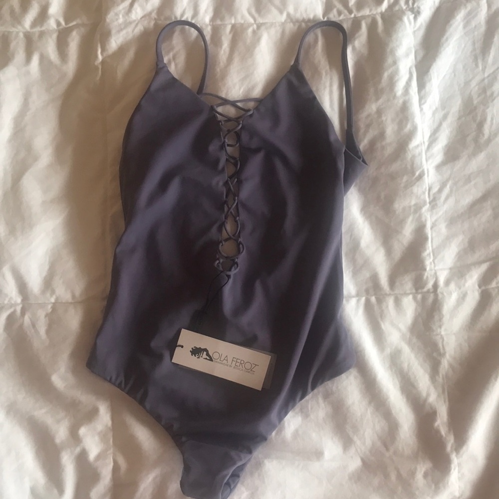 A brand new Ola Feroz brand one-piece swimsuit.